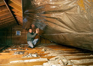 A radiant barrier installed in a Kalamazoo attic